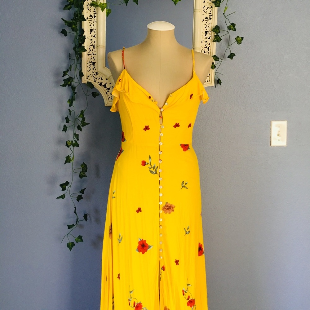 Missing button on top of the dress seen in picture